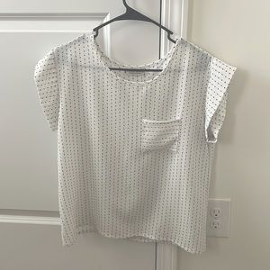 medium white Polk a dot blouse